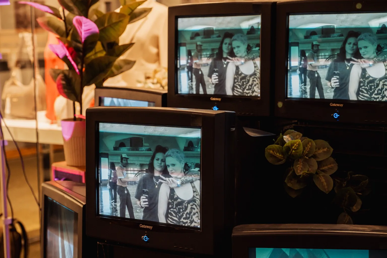 Audience engaging with an interactive CRT monitor installation